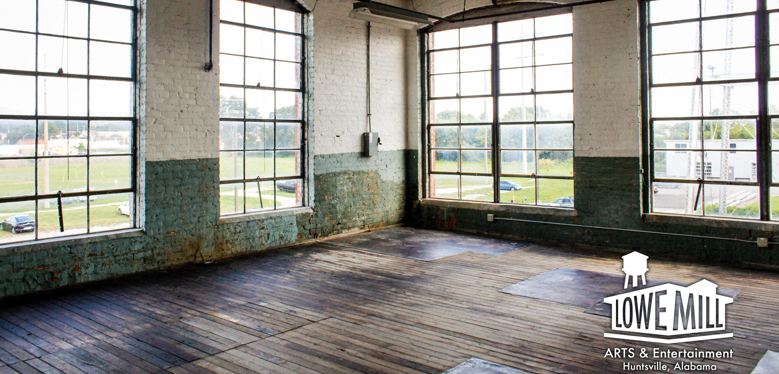 emptystudiowithlogo-scaled-cropped